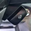 A close-up of the 2018 Subaru Impreza Sports steering wheel lever highlights the icon for its heated function, featuring a steering wheel with three wavy lines. The tech package enhances comfort and convenience within the car’s sporty interior.